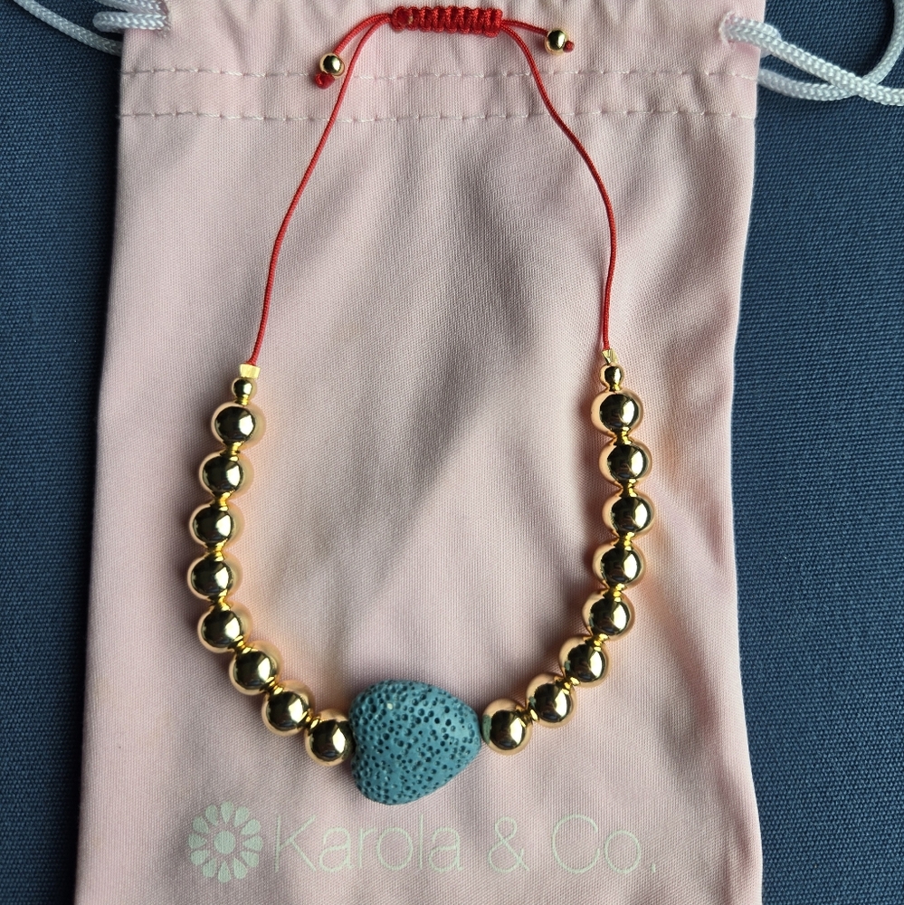Gold Bead Bracelet with Blue Stone Heart